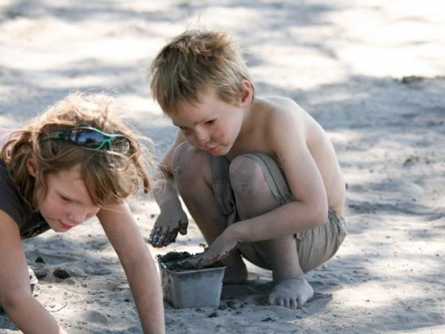 Kids playing in the Kalahari sand, Savute, Chobe National Park, Botswana