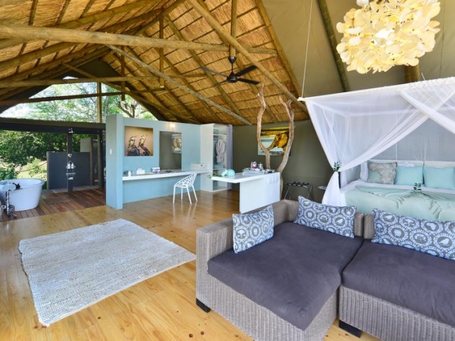 Victoria Falls River Lodge, spacious and luxurious bedroom, Victoria Falls package