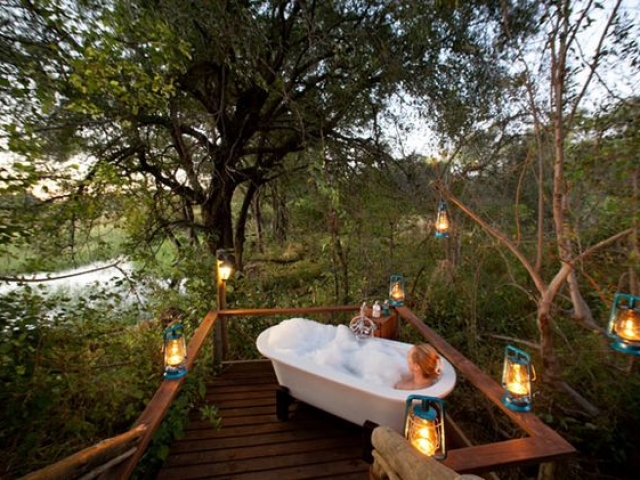 Pom Pom Camp, open air bath time, Botswana and Zimbabwe