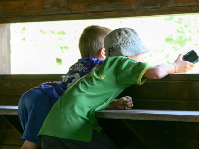 Looking for animals and birds at a hide in Mkuze Game Reserve, Kwa-Zulu Natal, South Africa