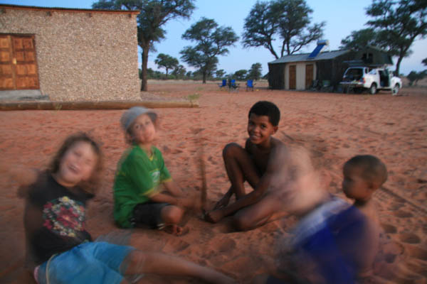 Playing in the sand with the #Khomani San in the Kalahari, South Africa