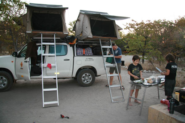 Camp cooking, Planet Baobab, Botswana - they always seem to help more when we are travelling than at home!