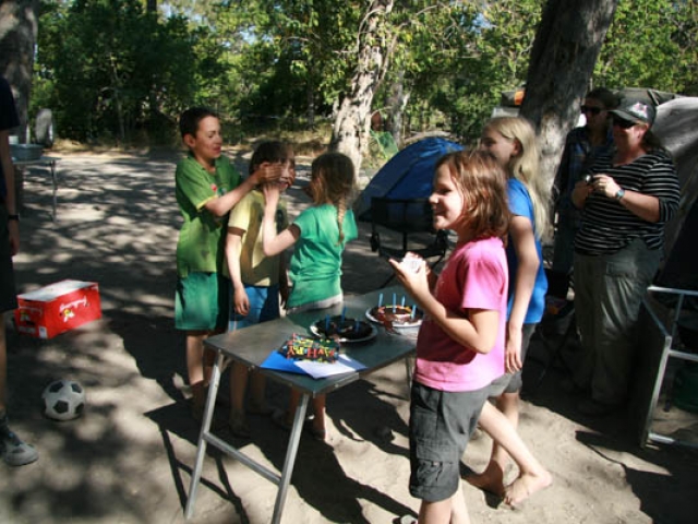 Birthday celebrations while camping in Botswana - chocolate brownie cakes baked in the camp oven!