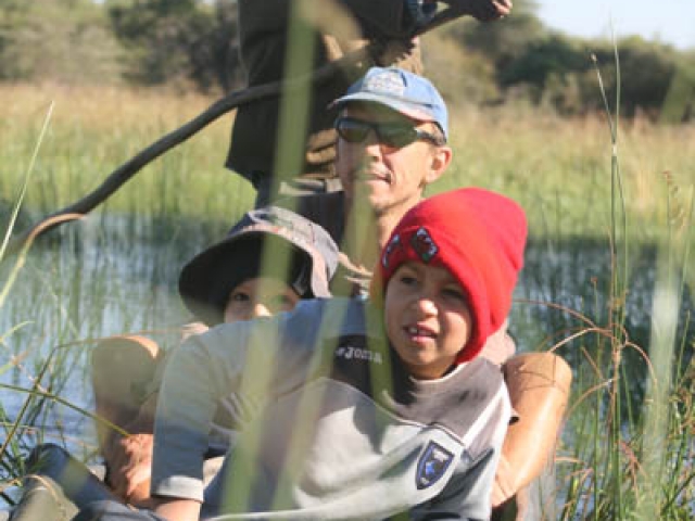 On a mekoro in the Okavango Delta, Botswana