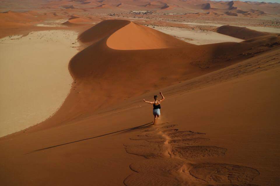 Running down a huge dune at Sossusvlei - Self drive Namibia and South Africa