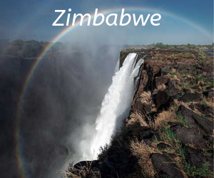 A rainbow over the iconic Victoria Falls, Zimbabwe