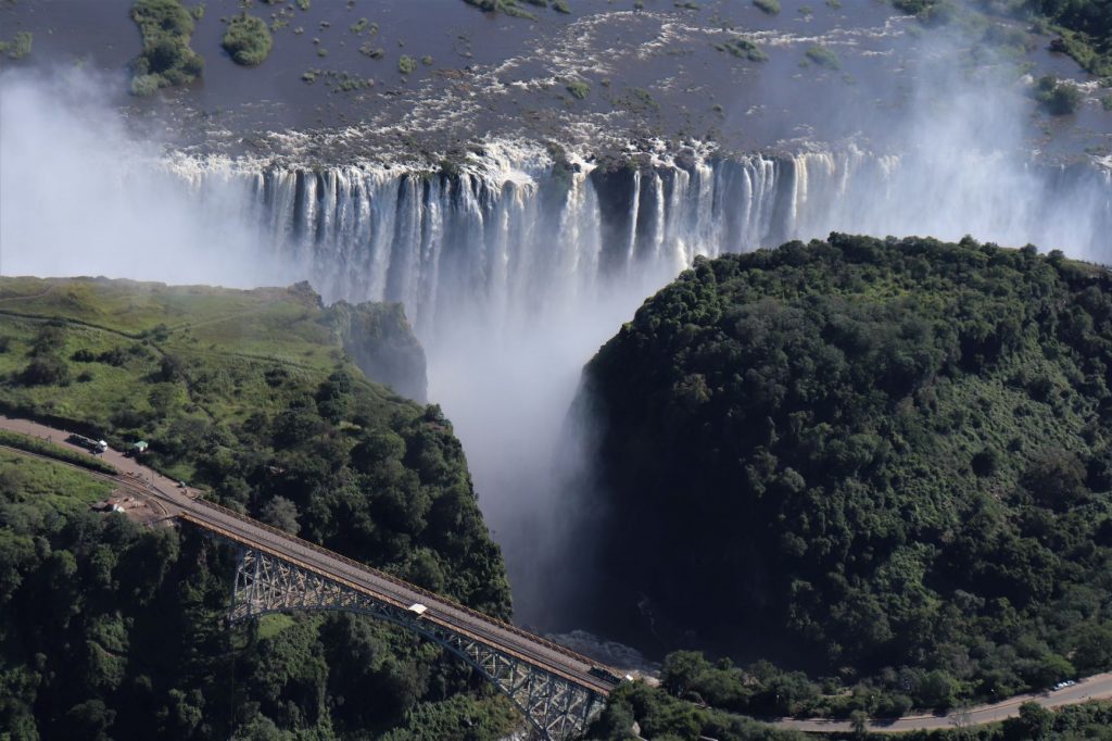 AN aerial view of the water thundering over the middle sectin of the Victoria Falls with bridge, Flight of Angels