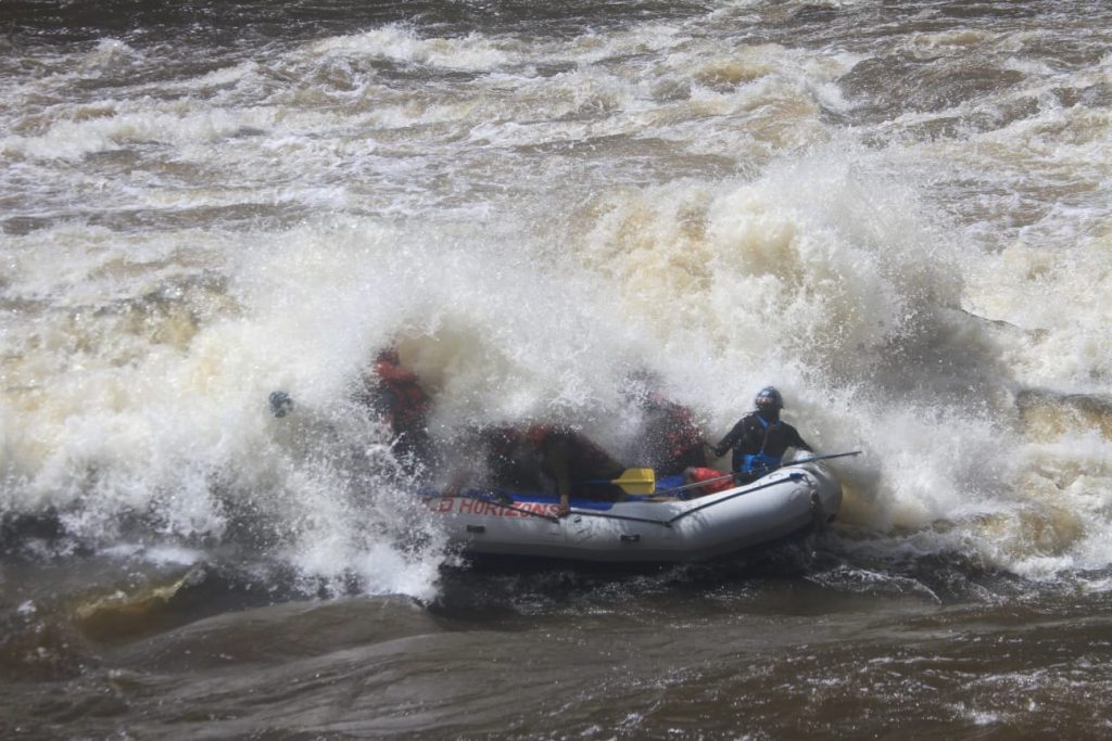 This photos is 75% white water and spray with just the side of the raft poking out the front.