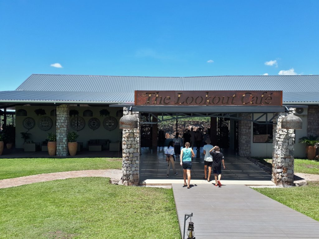 Walking into the gorgeous Lookout Cafe to get reading for the white water rafting adventure below the Victoria Falls..