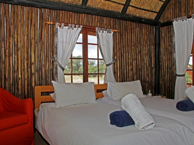 Namibia Wonders - Intu Africa Camelthorn Lodge - Bedroom, Kalahari (Standard)