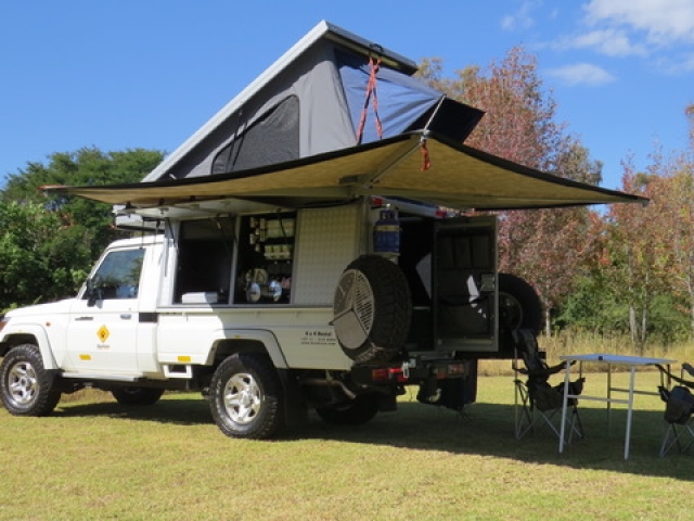 Bushcamper fully equipped camping 4x4 Landcruiser vehicle - wrap around canopy provides shade where ever you are.