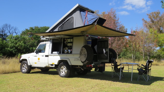 Bushcamper fully equipped camping 4x4 Landcruiser vehicle - wrap around canopy provides shade where ever you are.