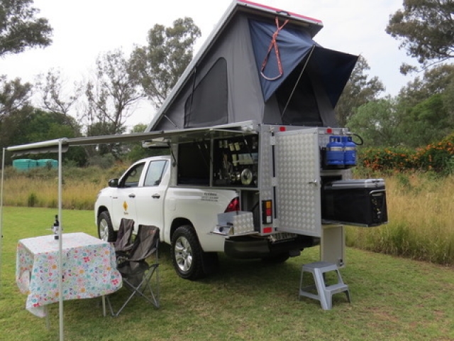 Bushcamper fully equipped camping 4x4 vehicle - roof top tent sets up in seconds