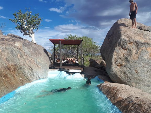 The stunning pool at Hoada campsite nestled right amongst the granite boulders, Namibia, self drive accommodation options