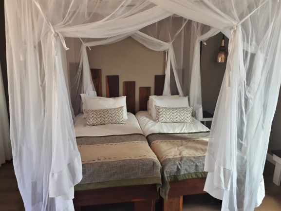 Kalahari Anib Lodge comfy room interior, Namibia