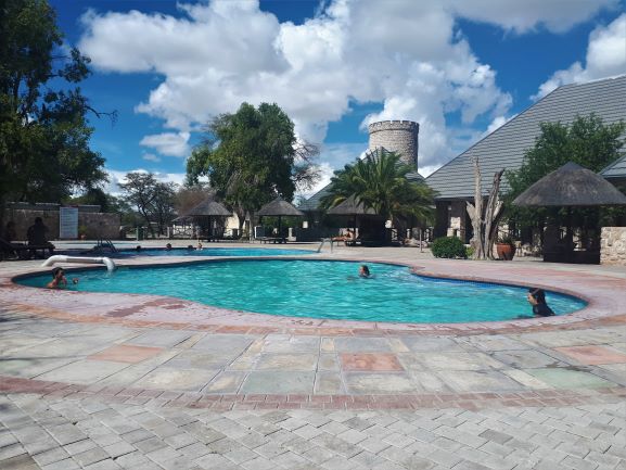 The big pool to cool off in at Okaukuejo Rest Camp, Etosha, Namibia