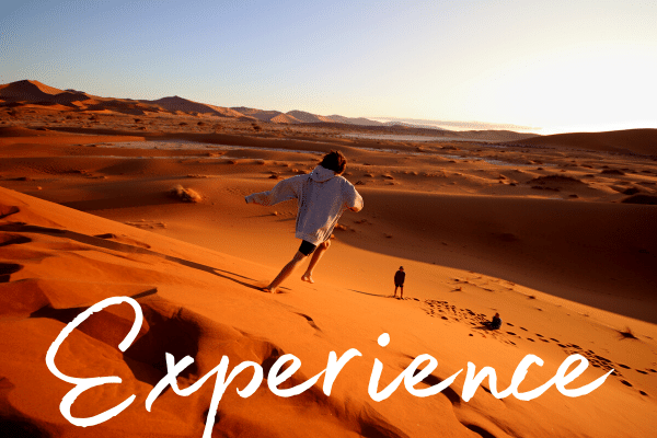 Our son Cadan running with pure joy down a stunning red sand dune at Sossusvlei in Namibia