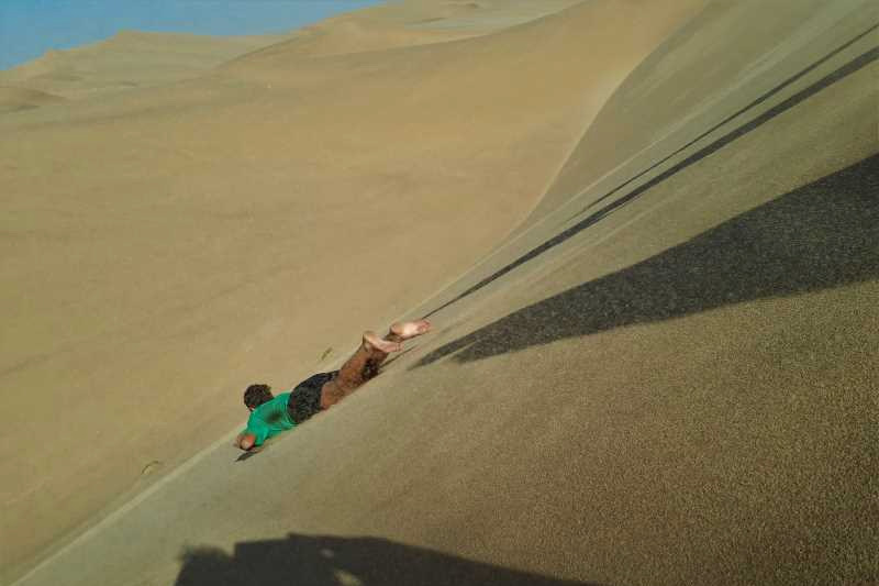 Lie down sand boarding Swakopmund