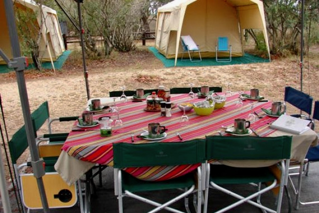 Kruger glamping dining area and tents