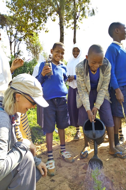 Planting trees with school children in Tanzania