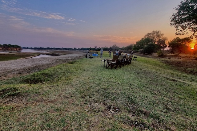 Breakfast at sunrise on the banks of the Luangwa River, Nsefu, Zambia