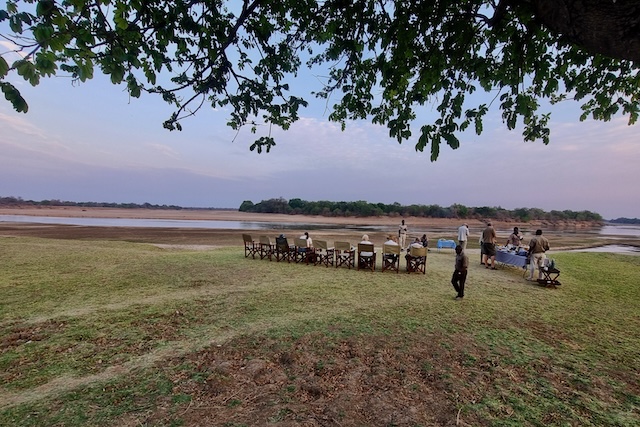 Nsefu Camp, breakfast on the riverbank, South Luangwa, Zambia Nsefu Camp, breakfast on the riverbank, South Luangwa, Zambia