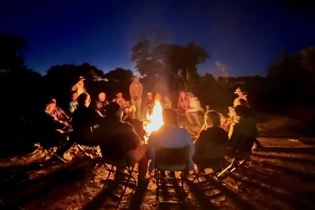 Around the campfire at the Eastern Delta Delight mobile camp, Okavango Delta